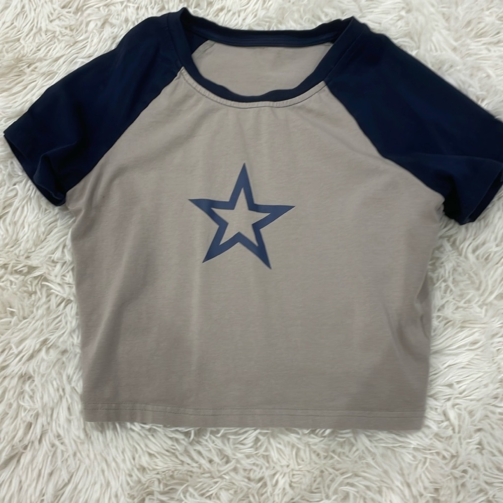 It is a crop top, cotton t-shirt. It is also y2k